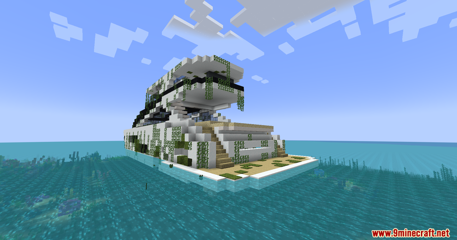 The front of an overgrown, abandoned yacht at sea