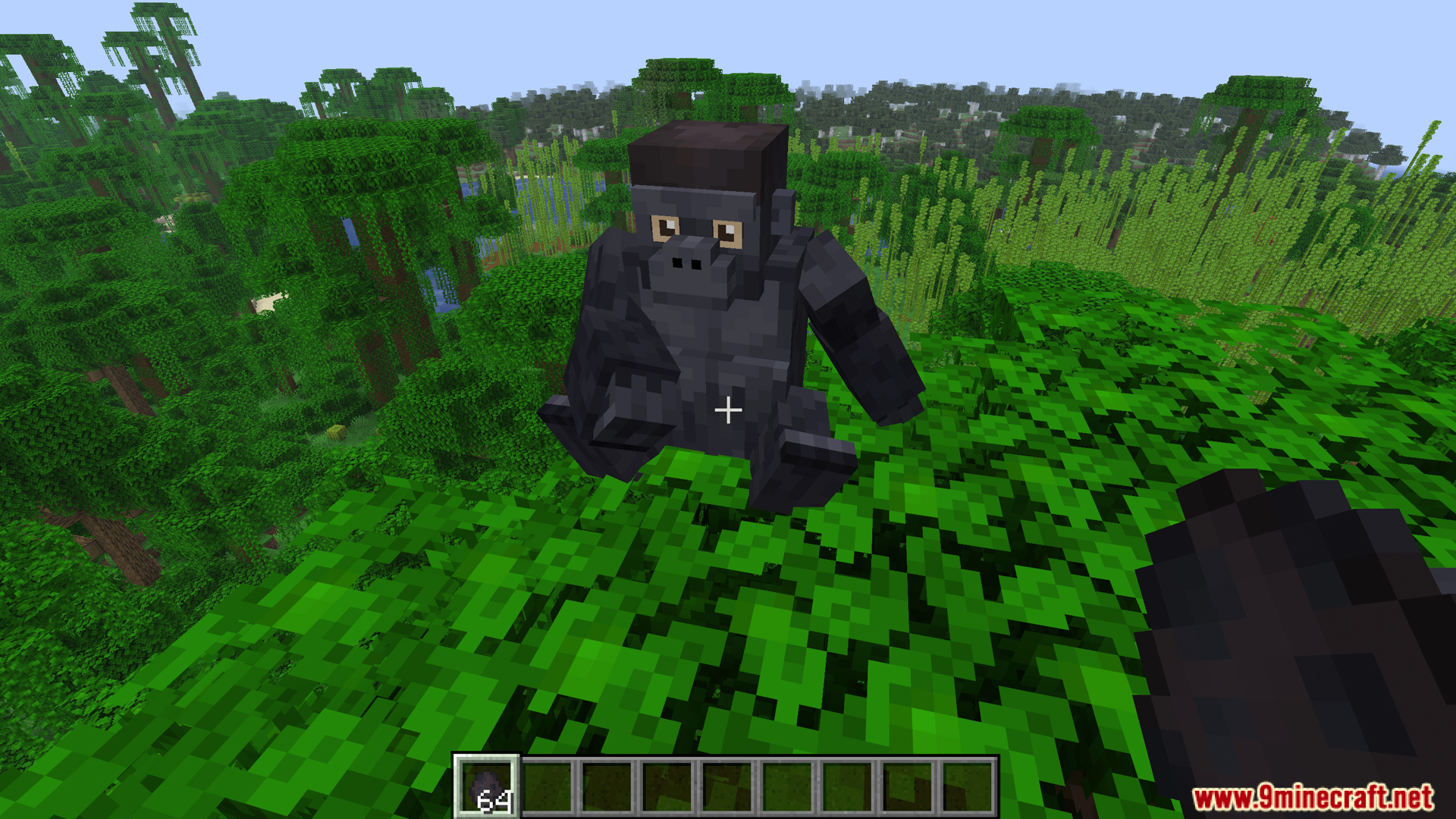 Gorilla sitting down to rest in the lush jungle biome