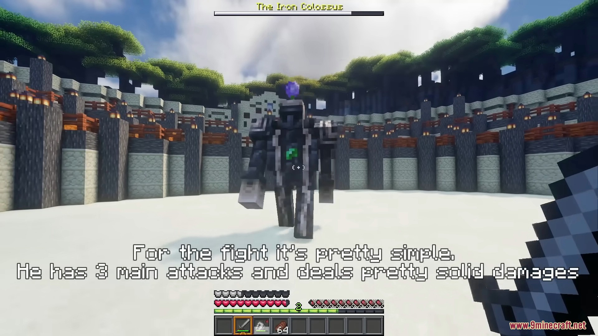 Player fighting The Iron Colossus boss in an arena