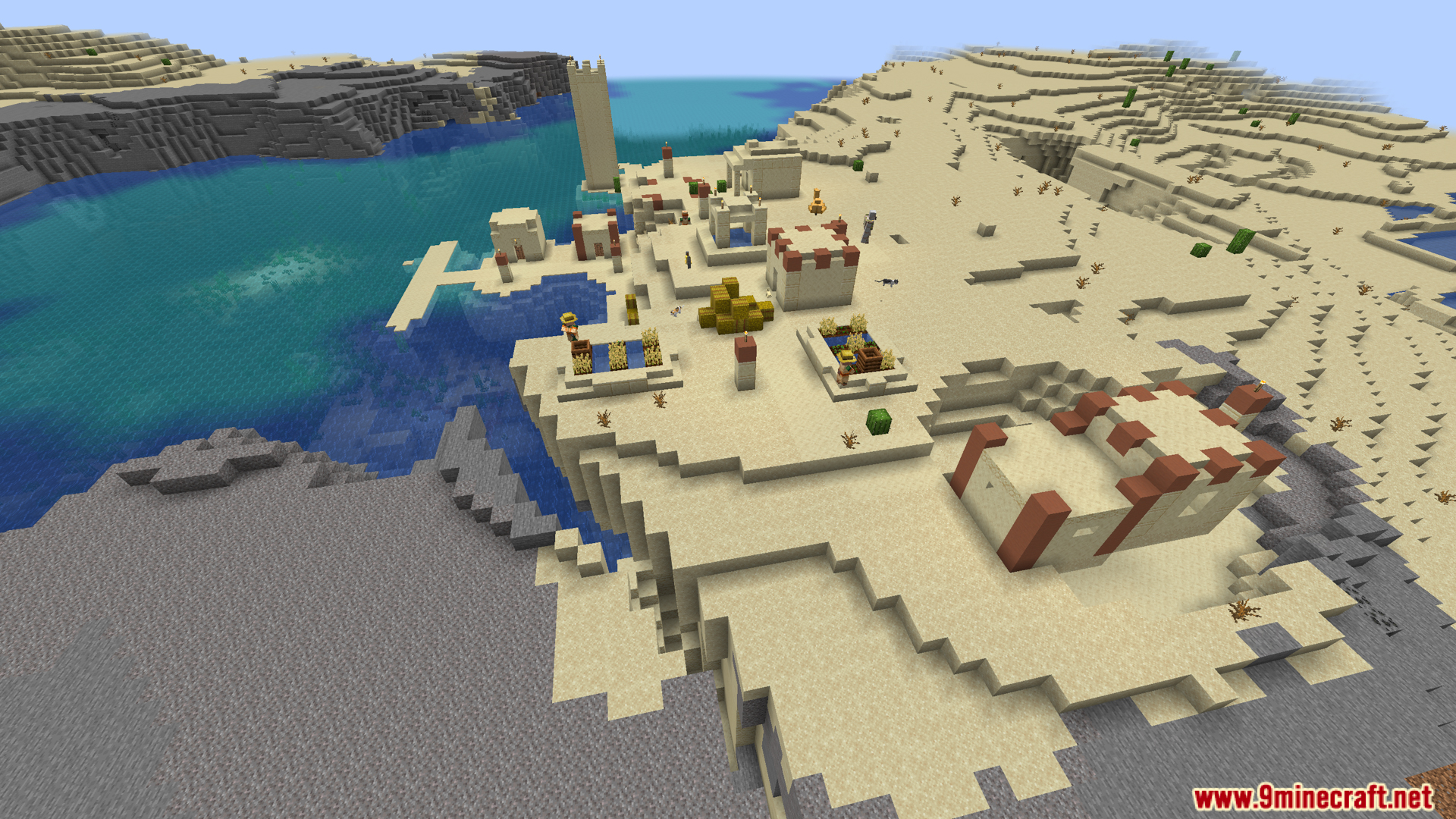 Aerial view of a large desert village by the ocean