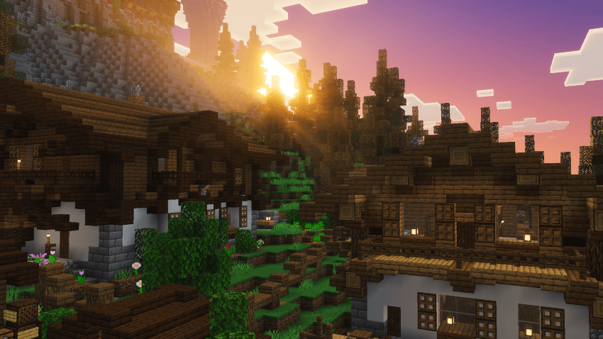 A scenic Minecraft Bedrock village featuring detailed wooden mountain houses