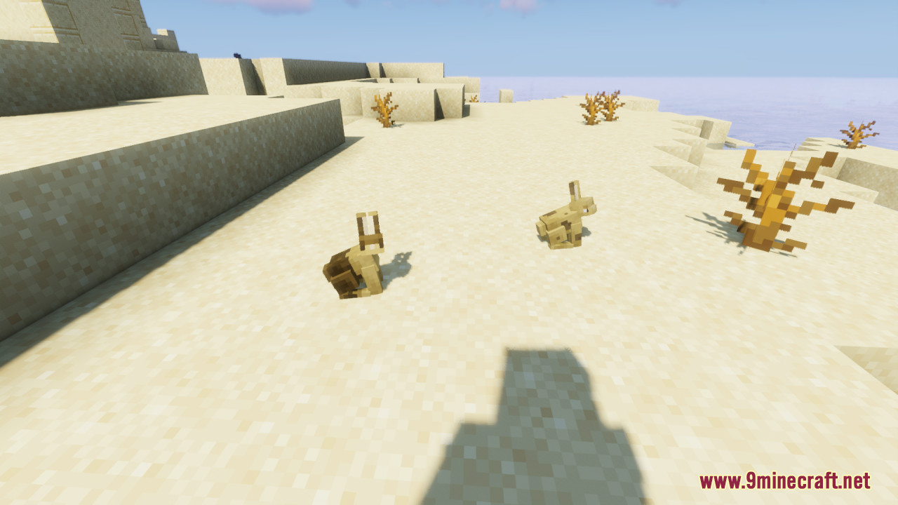 Two brown rabbits with updated 3D models in a desert biome