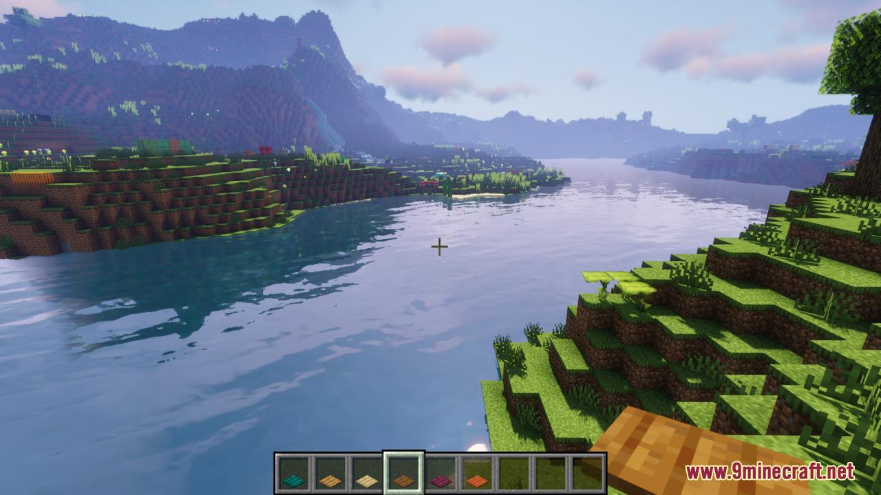 A view of a river and mountains in Minecraft