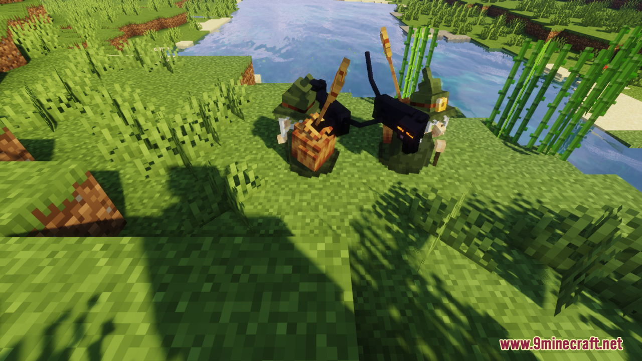 Two dwarf witches with cats by the river