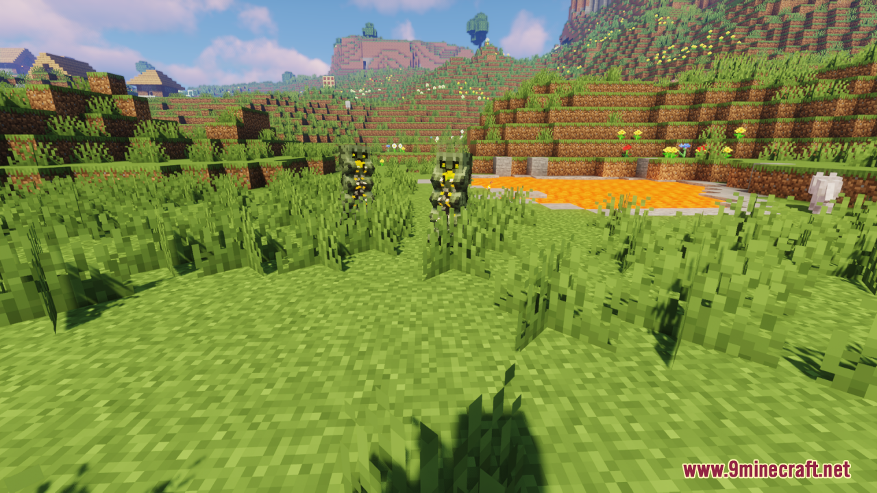 Redesigned creepers with glowing yellow details walking through tall green grass