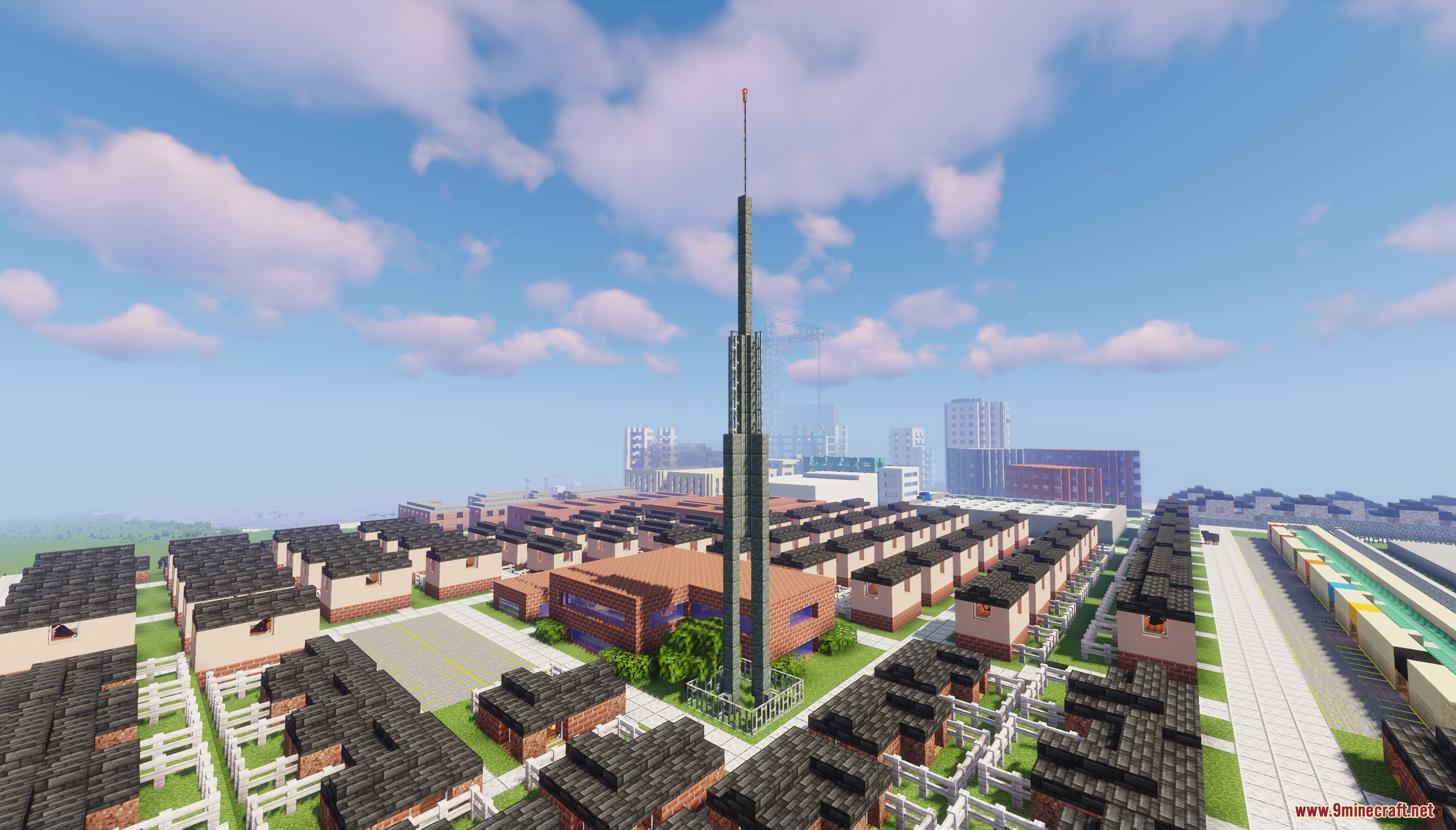 Residential neighborhood with small houses and a tall communication tower
