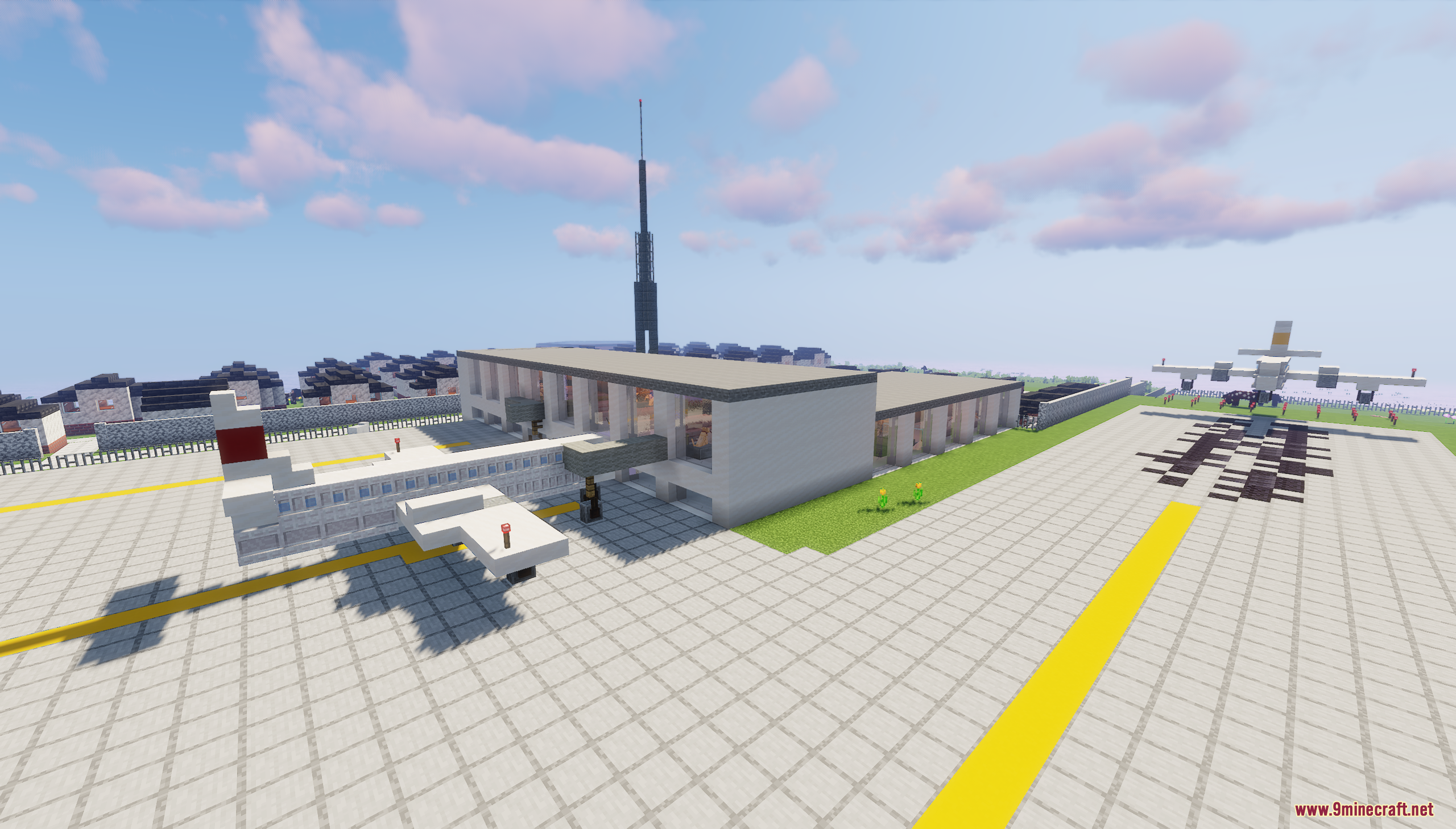 Airport terminal with airplanes on the runway and a control tower