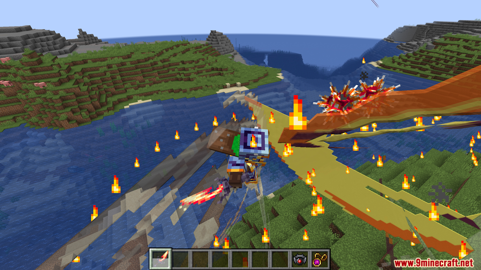 Player with fiery wings fighting a dragon