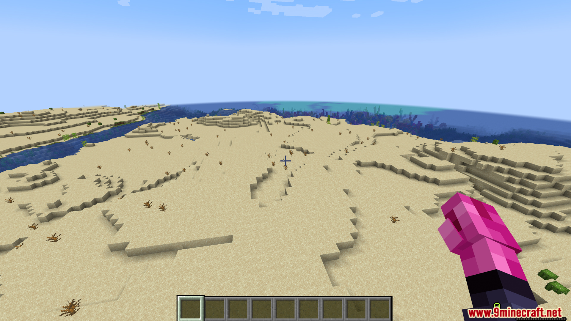 First person view showing the pink crystal hand of the alien