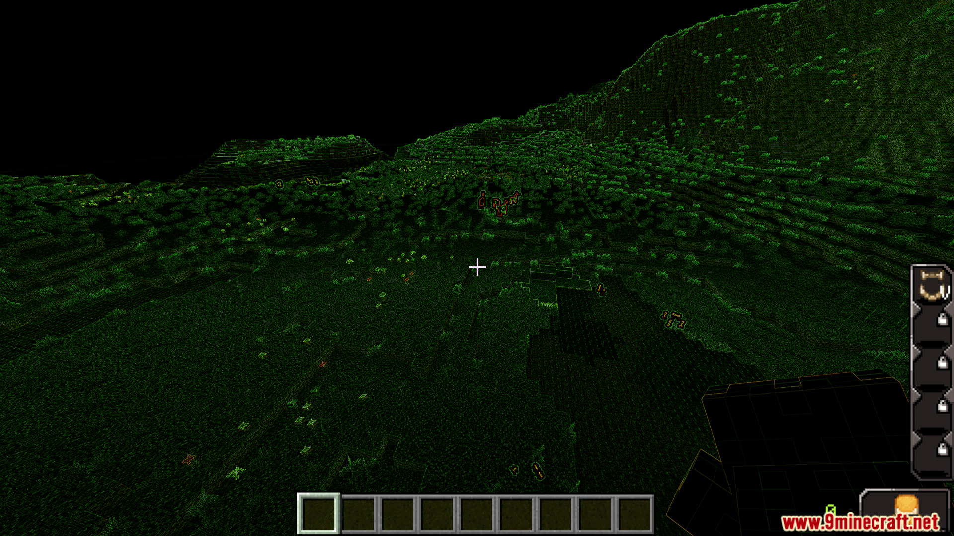 Dark green night vision effect looking over a Minecraft landscape