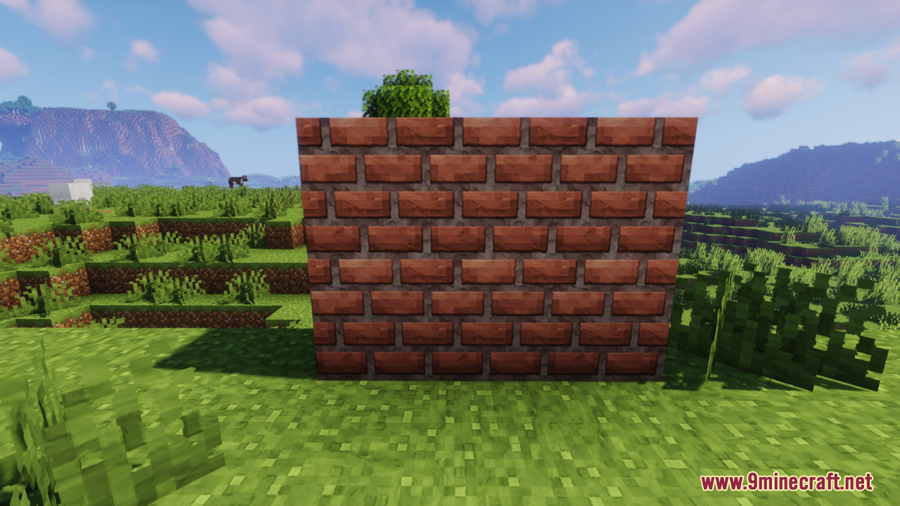 Wall built with red brick blocks featuring a soft clay appearance