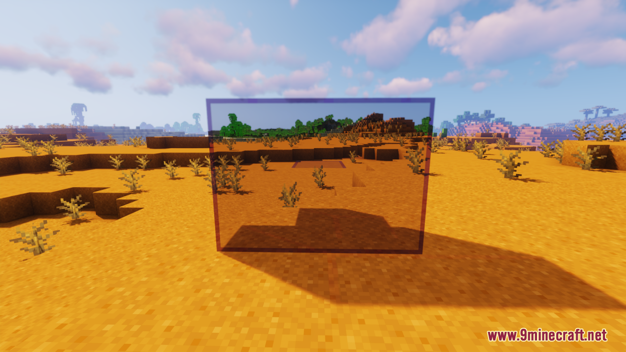 A tinted glass block reflecting the desert landscape