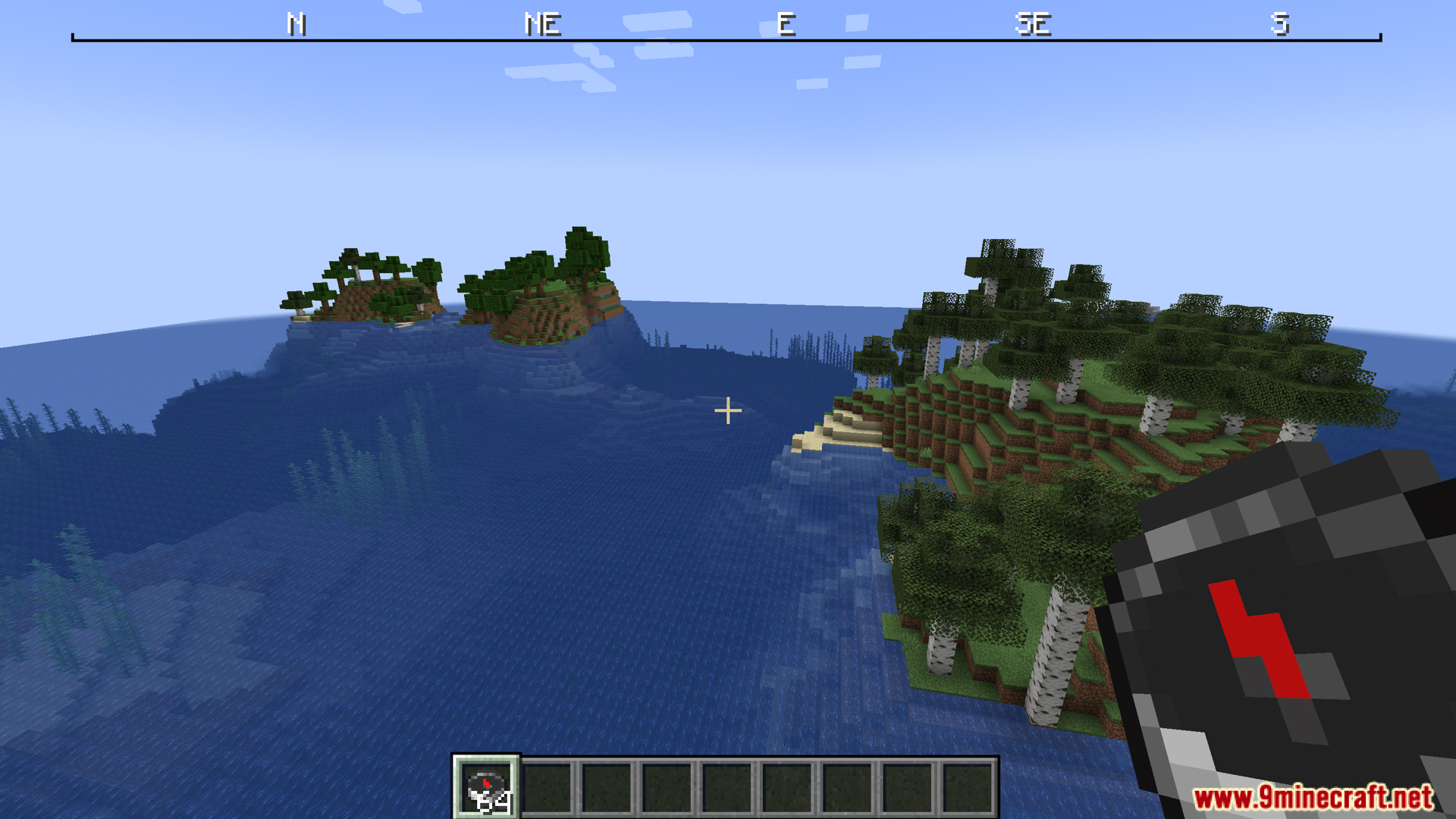 Ocean view with islands compass held and top compass ribbon