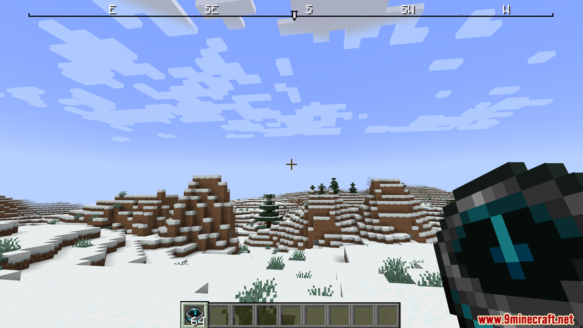 Snowy landscape with recovery compass held and top compass ribbon