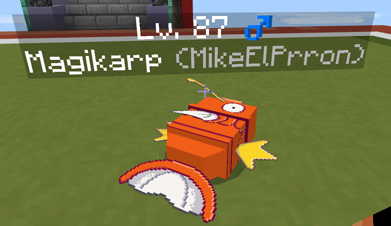 Detailed Pokedrock Addon Mod Screenshot 1 High level blocky Magikarp resting on green grass in game