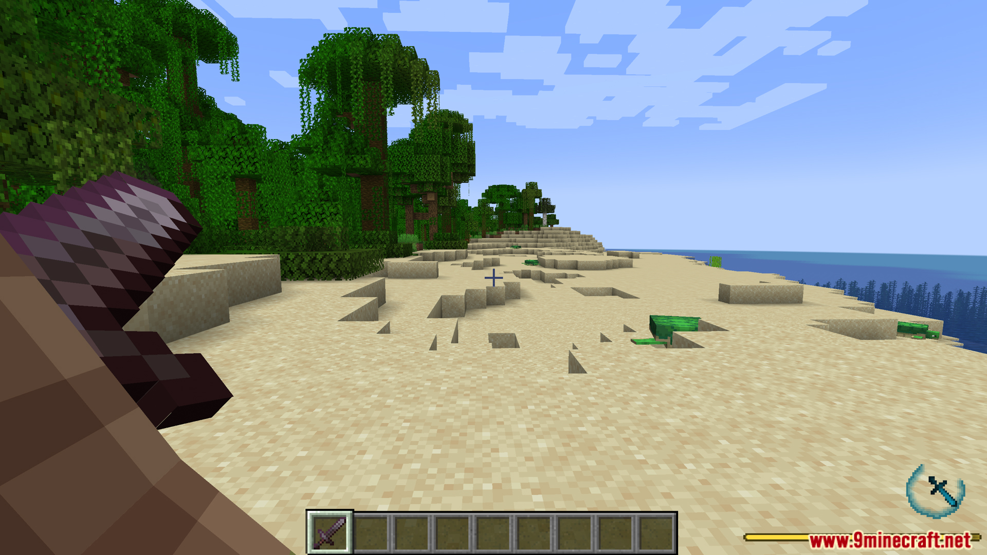 Player holding a weapon on a beach
