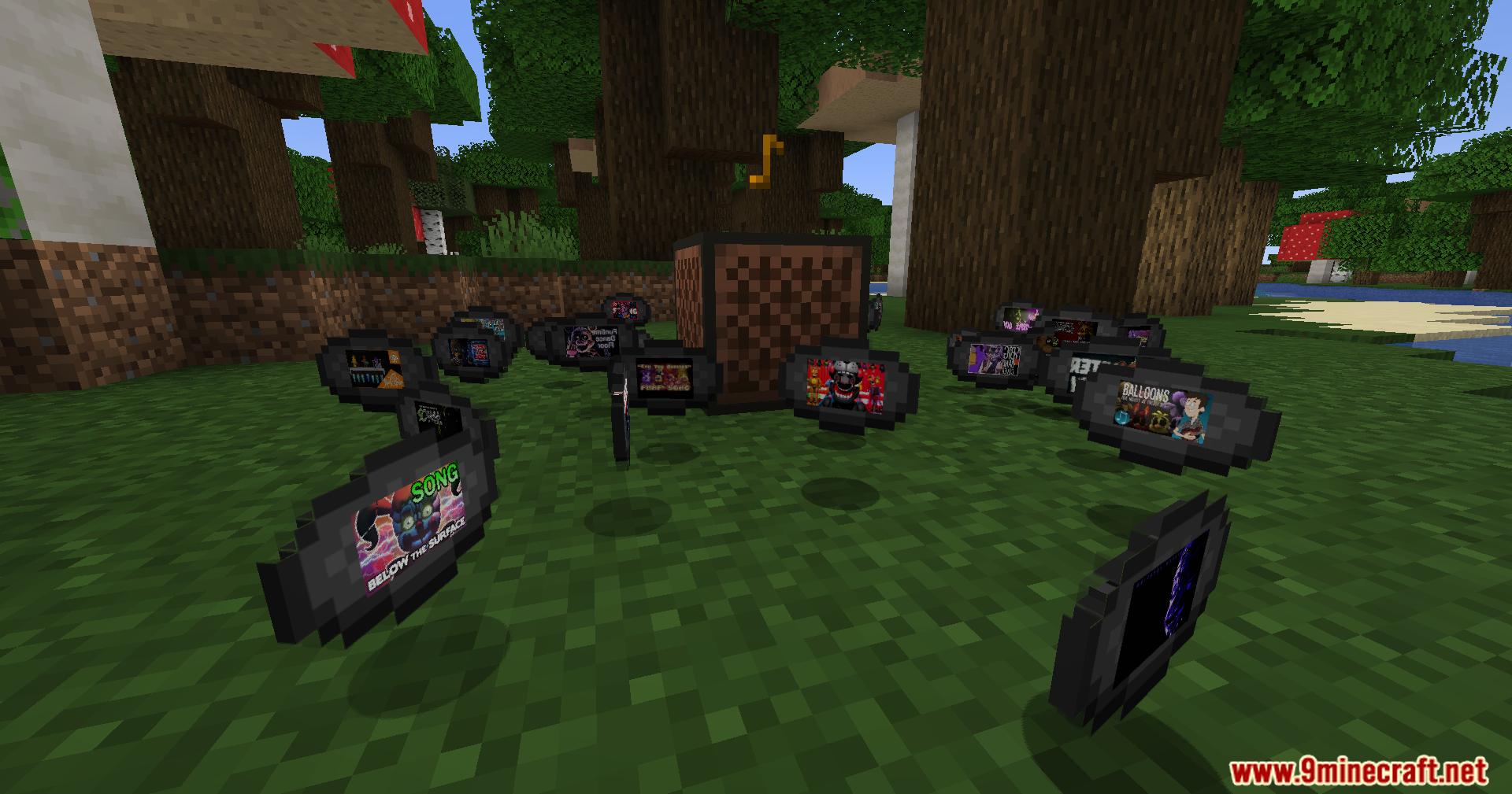 Custom Fnaf music discs scattered on the grass around a jukebox