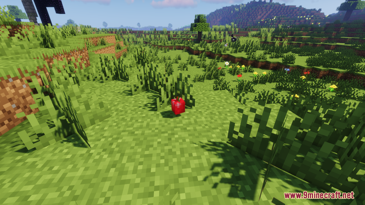 Custom 3D red apple item dropped on the grassy ground