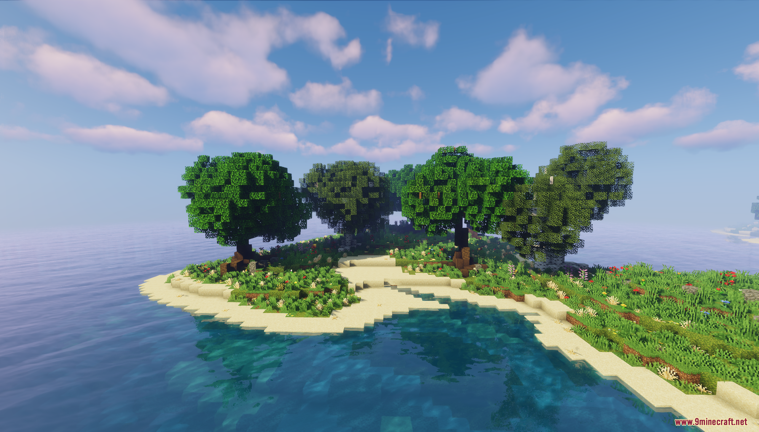 A small island with trees and a sandy beach