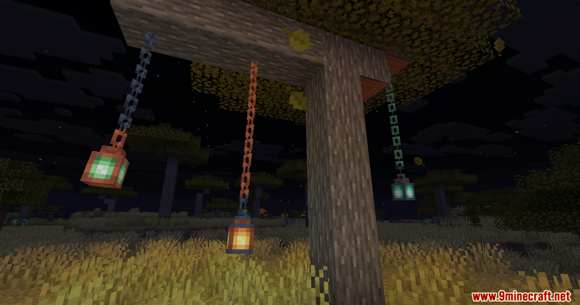 Animated lanterns swinging from chains attached to a wooden structure