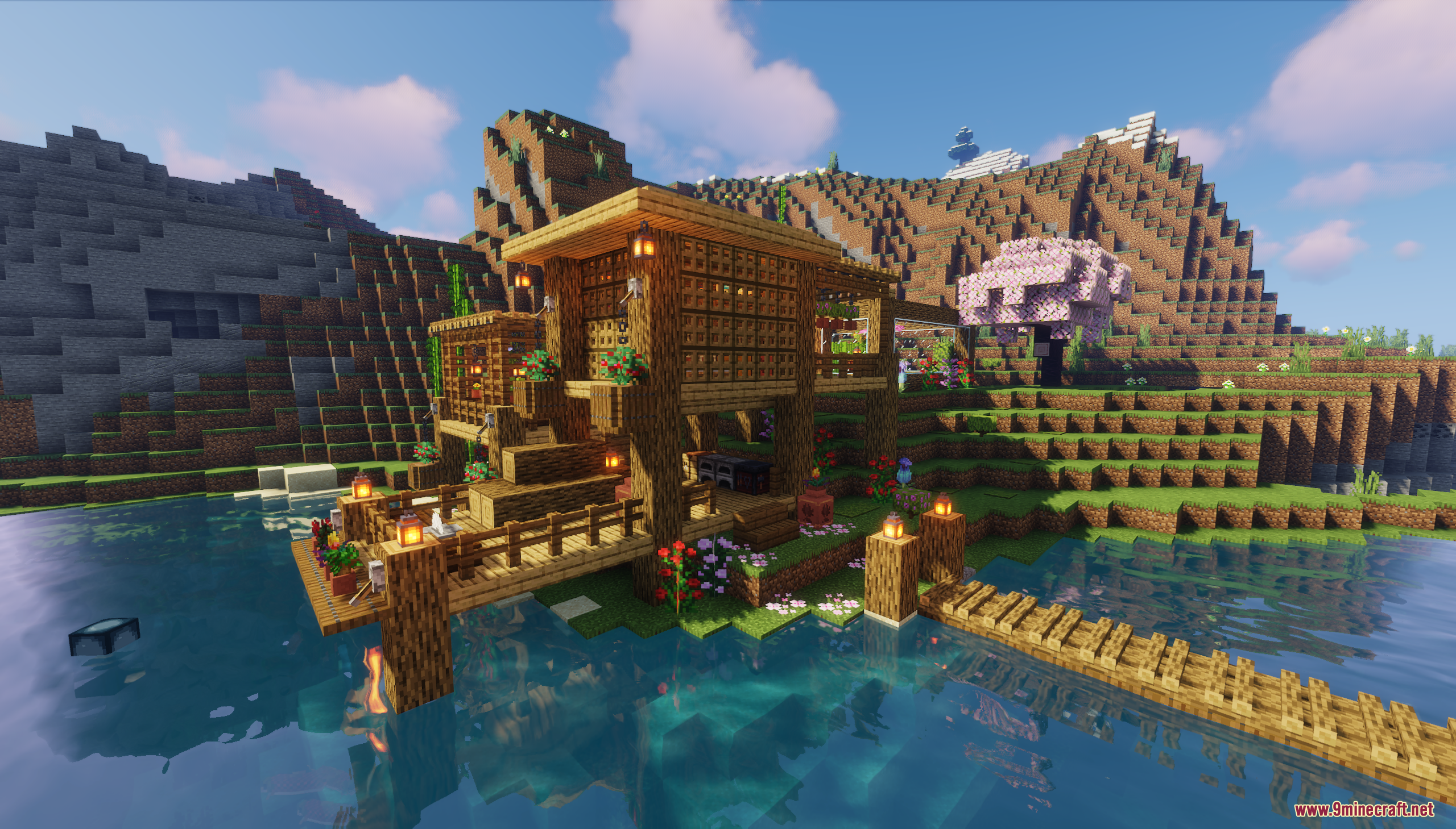 A cozy wooden house built on the riverbank