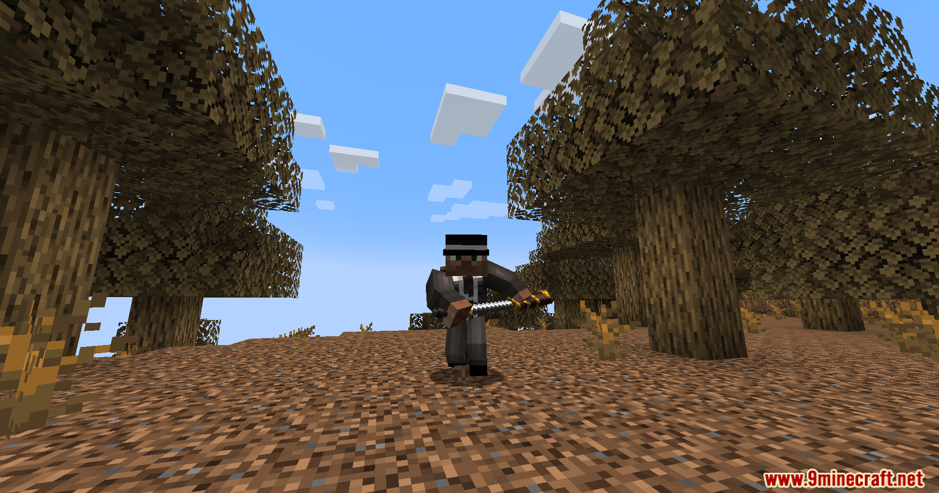 Front view of player character running with sword in badlands