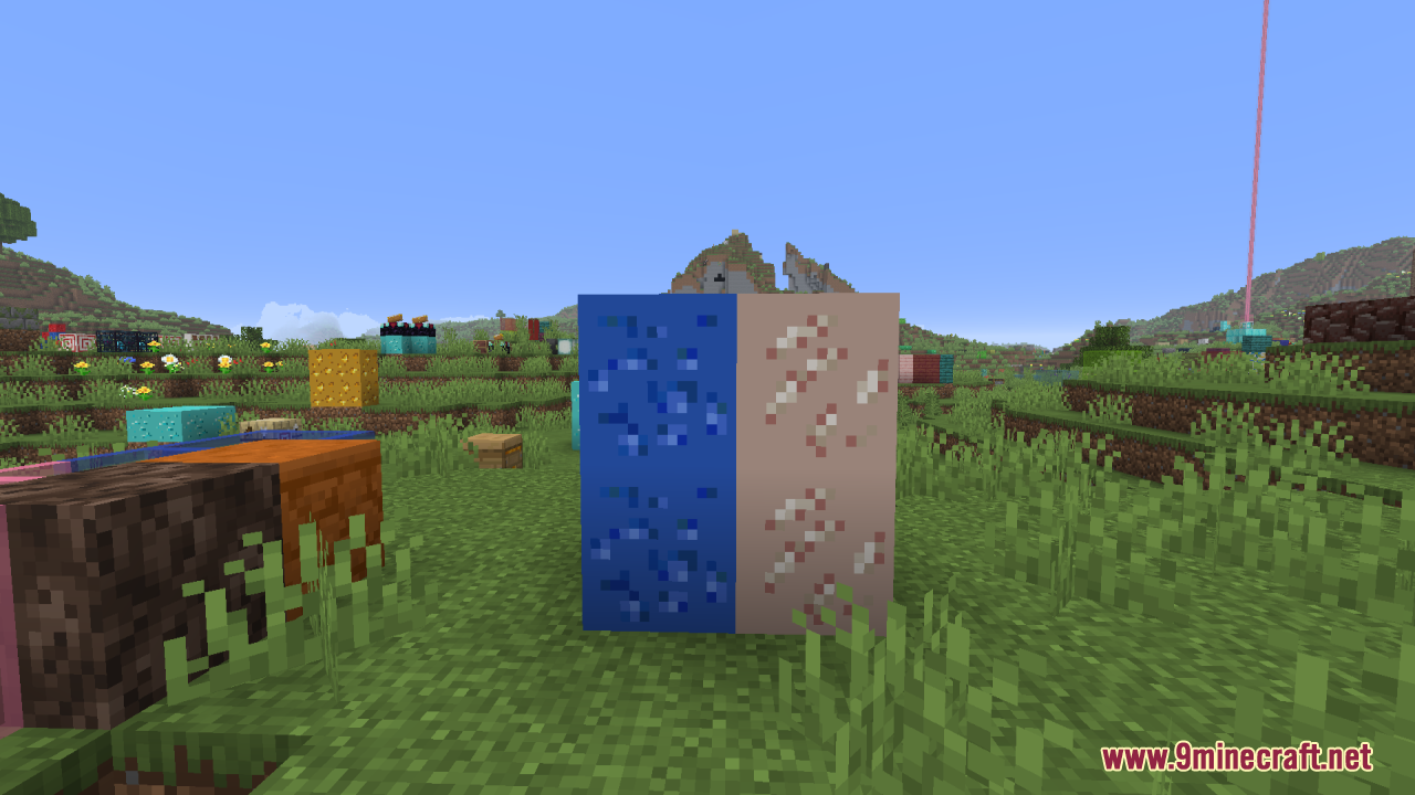 Blue and pink modded ore blocks displaying custom glowing textures