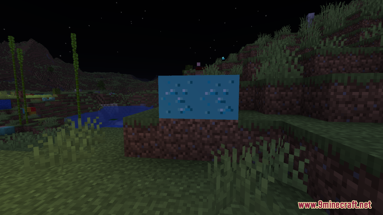 Two glowing diamond ore blocks on dirt at night