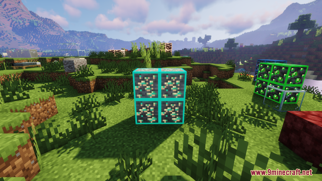 Four glowing diamond ore blocks placed together in a grassy field