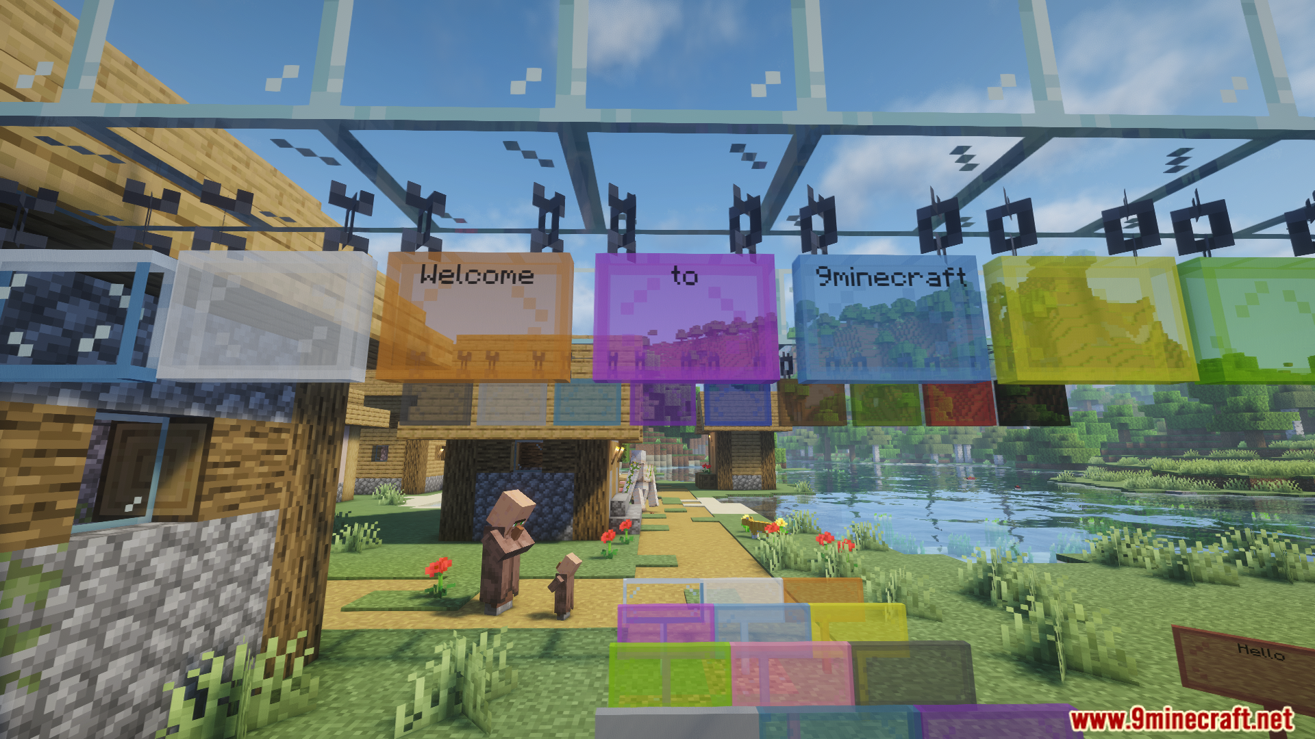Colored hanging glass signs displaying text in a Minecraft village setting