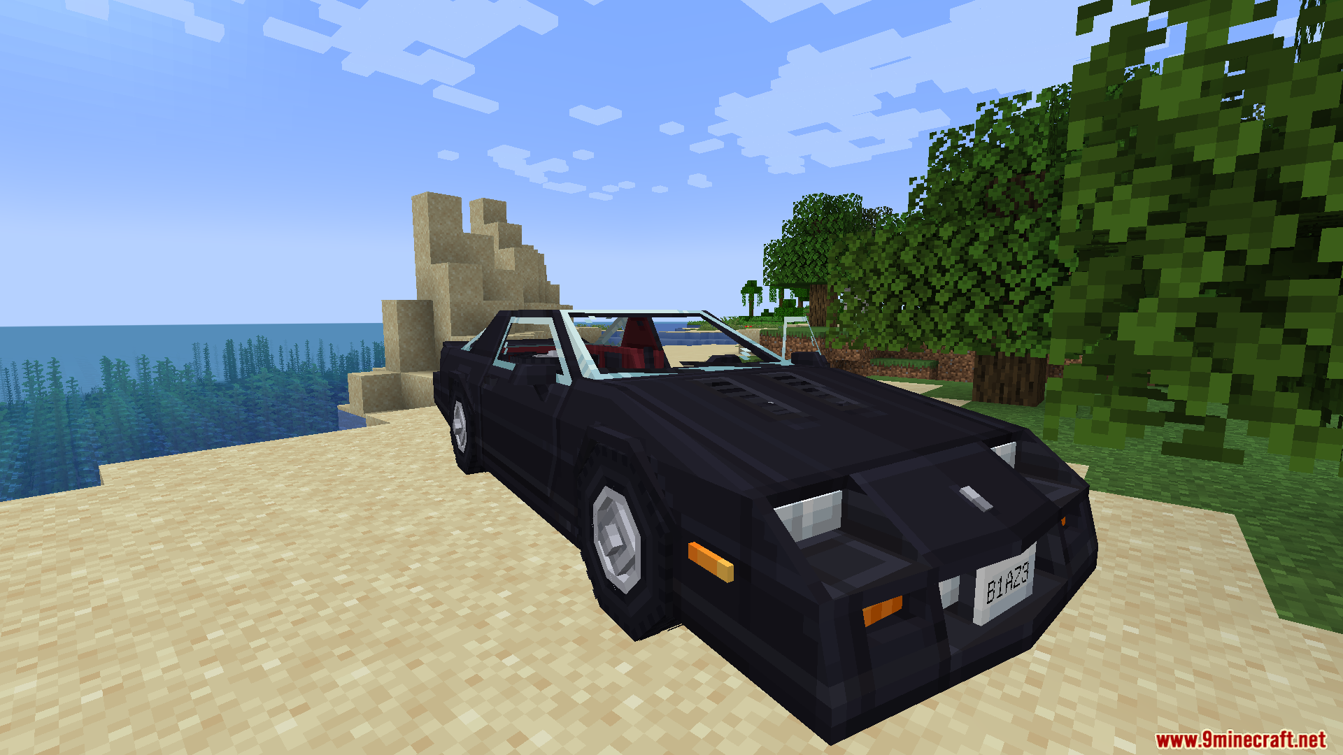 Black sports car from Official Automobile Pack parked on beach