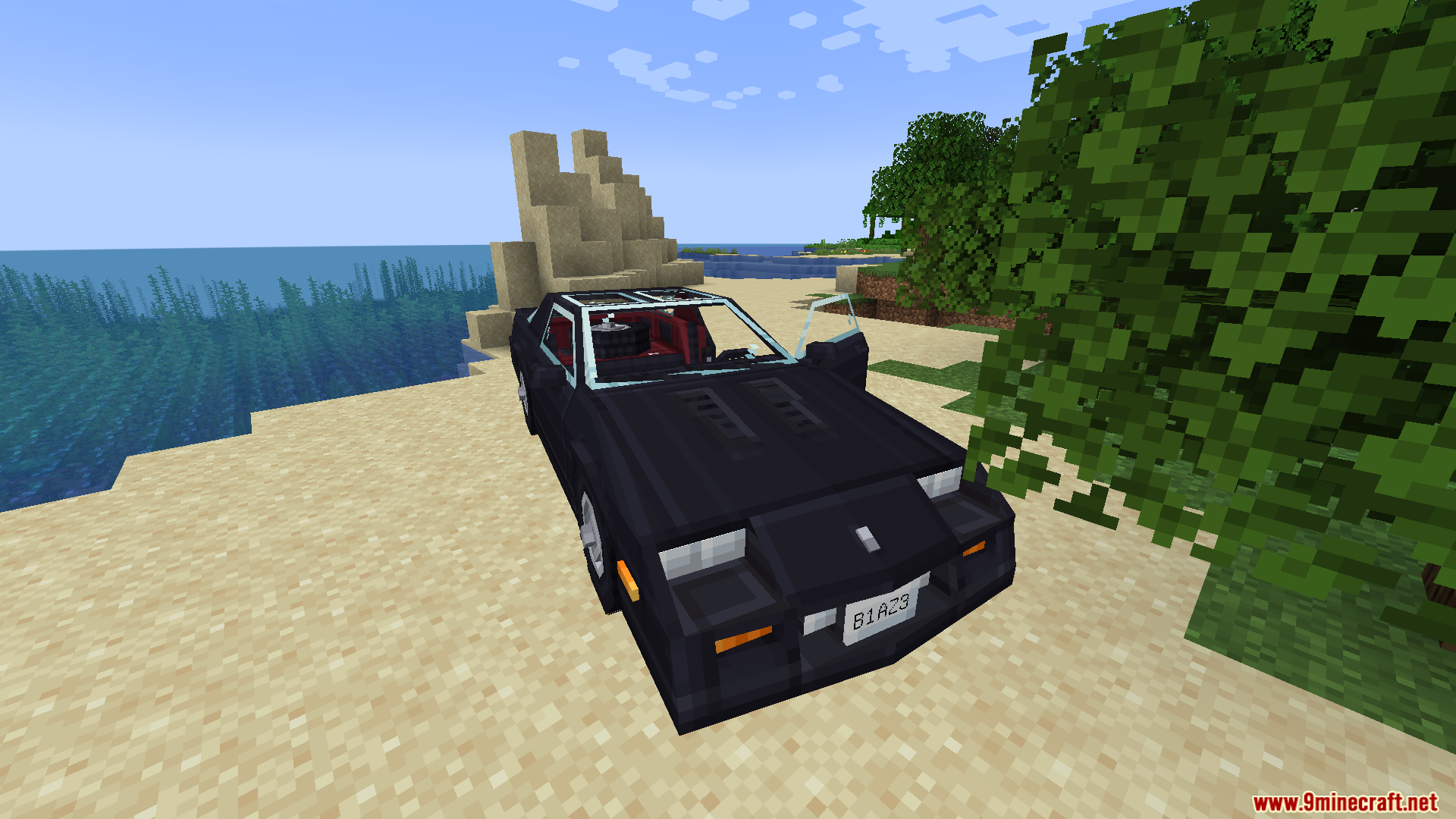 Black sports car with open door showing its red interior