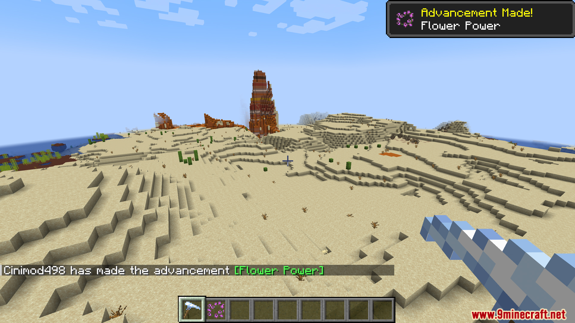 Player exploring a desert biome and earning the Flower Power advancement