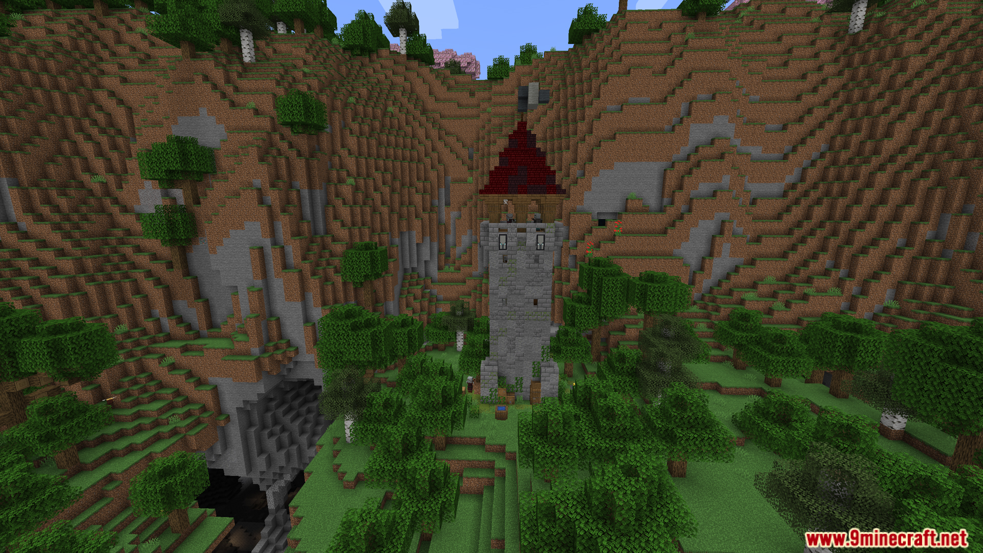 Tall stone illager tower with red roof in grassy valley
