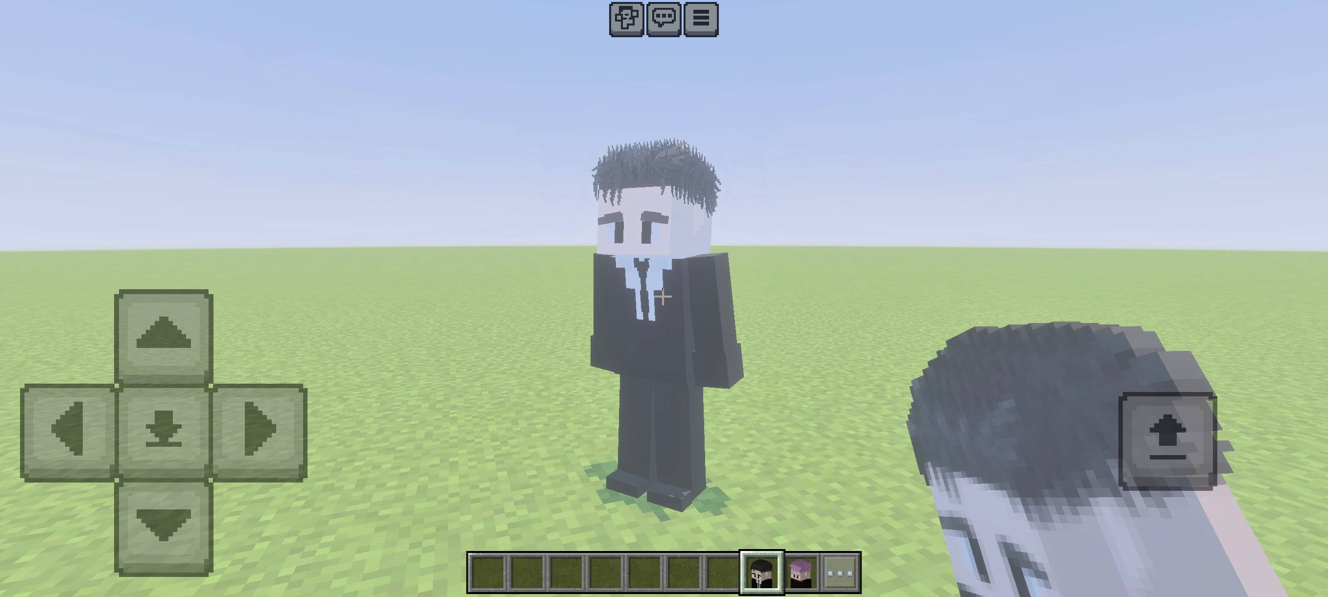 Black suited anime character standing in a flat grassy Minecraft world