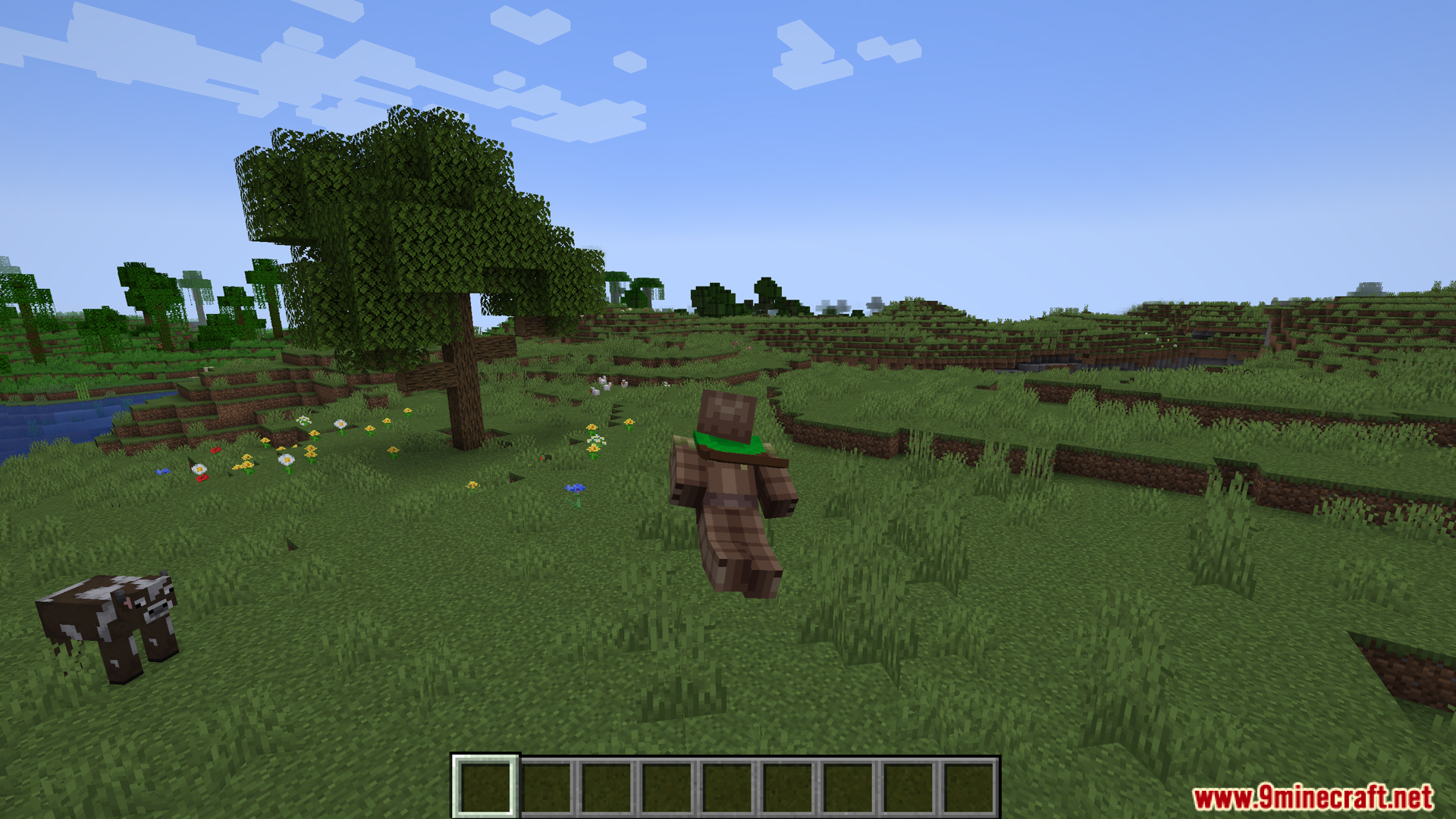 Player character walking through a grassy plains biome