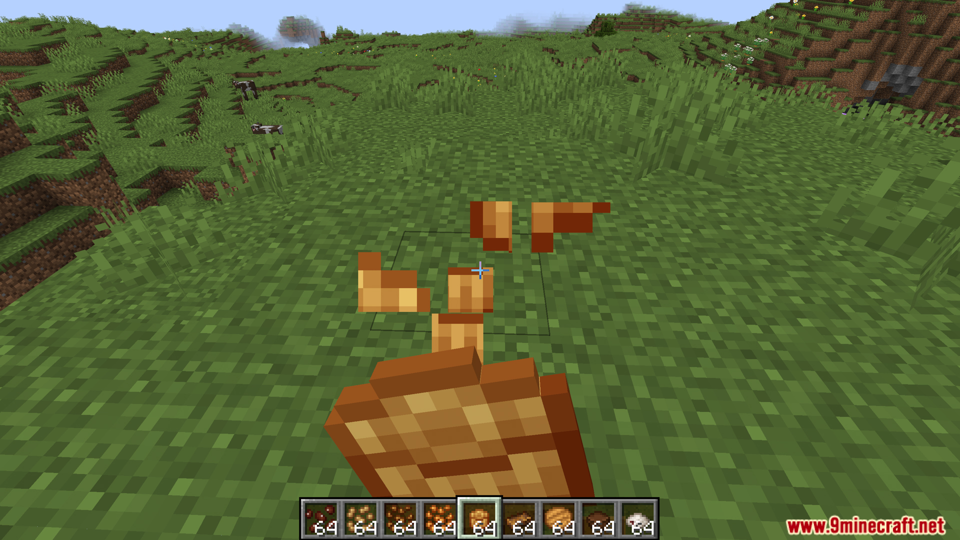 Legume Delight Mod Screenshot 6 Player holding a large cookie with crumbs falling on the grass