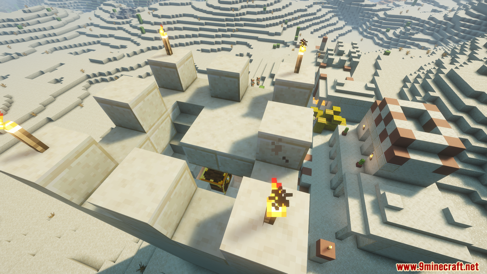 A desert structure with a hole leading to loot