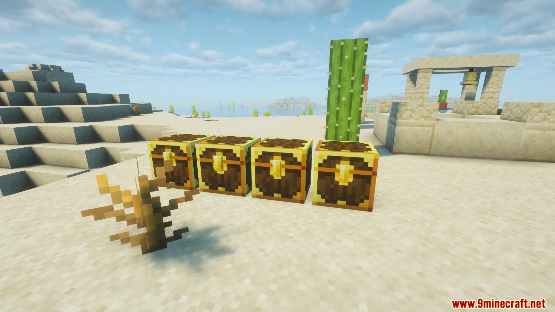 Four special golden loot chests lined up in the desert