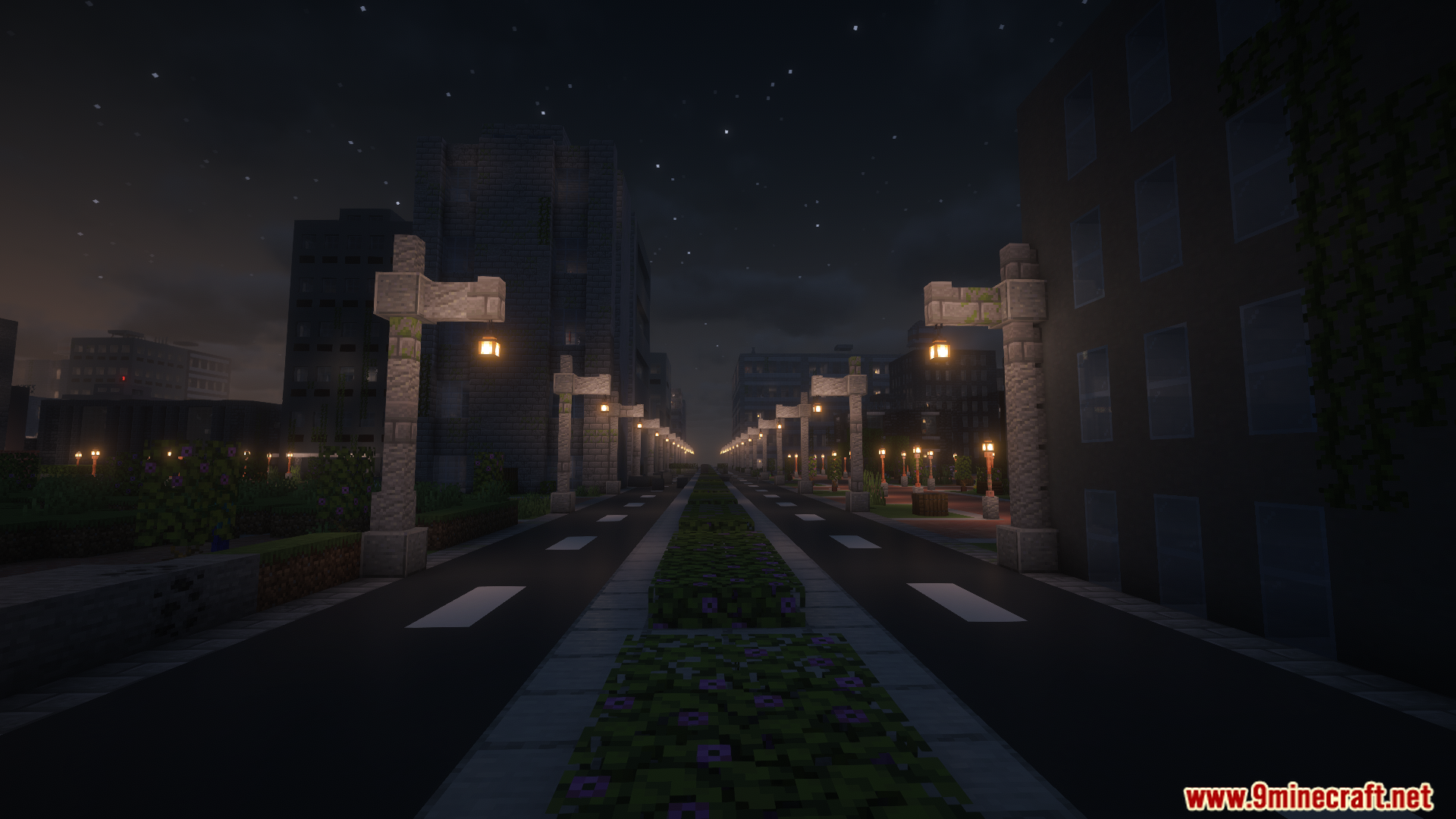 A modern city street lined with glowing lamp posts