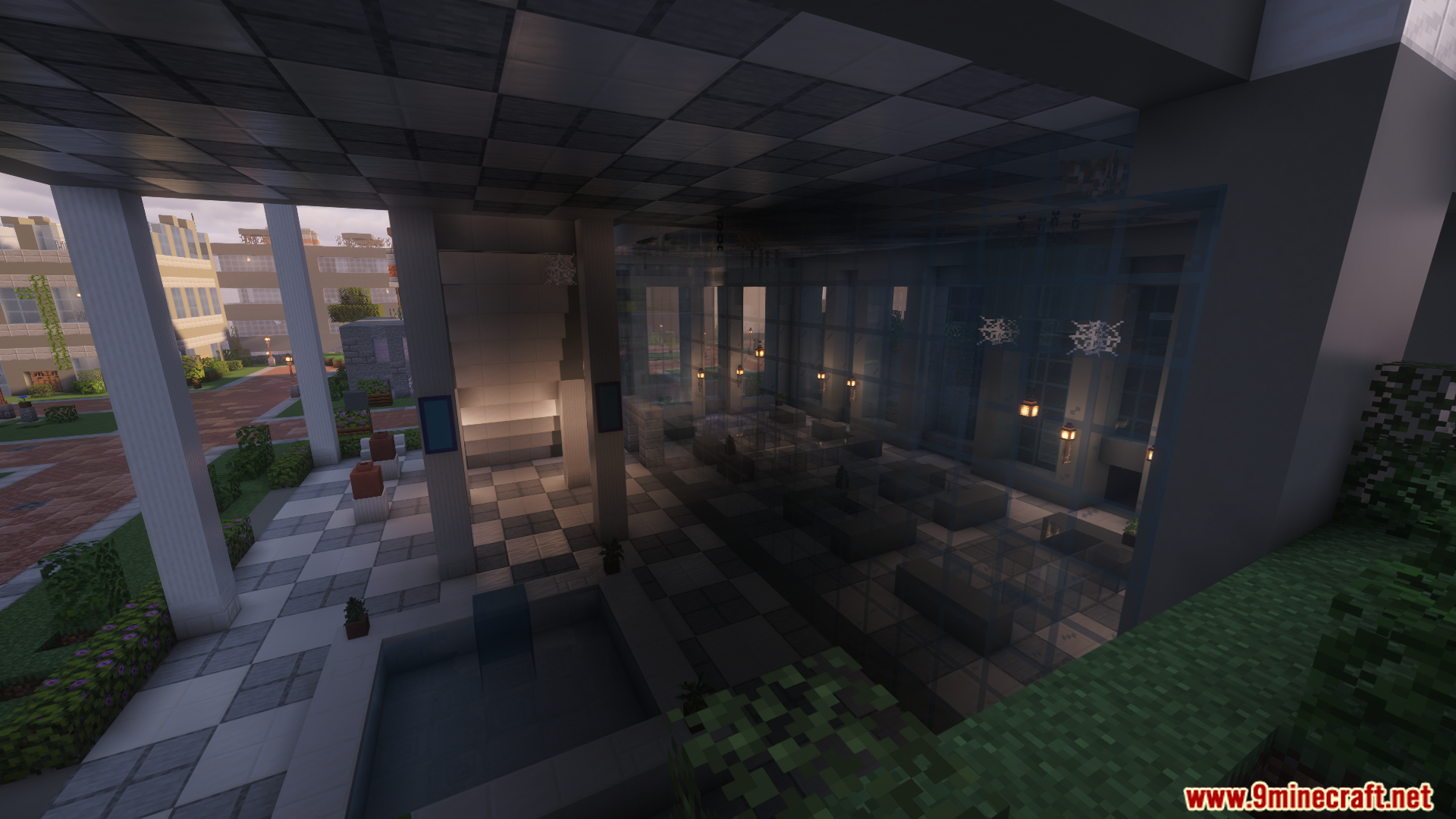 Interior of a modern building with glass walls and checkered floors