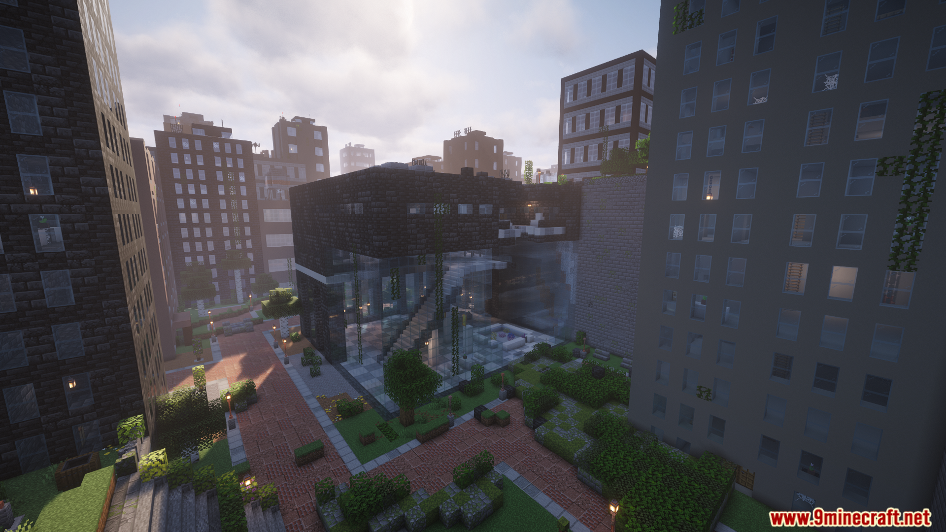 A modern glass building surrounded by overgrown city streets