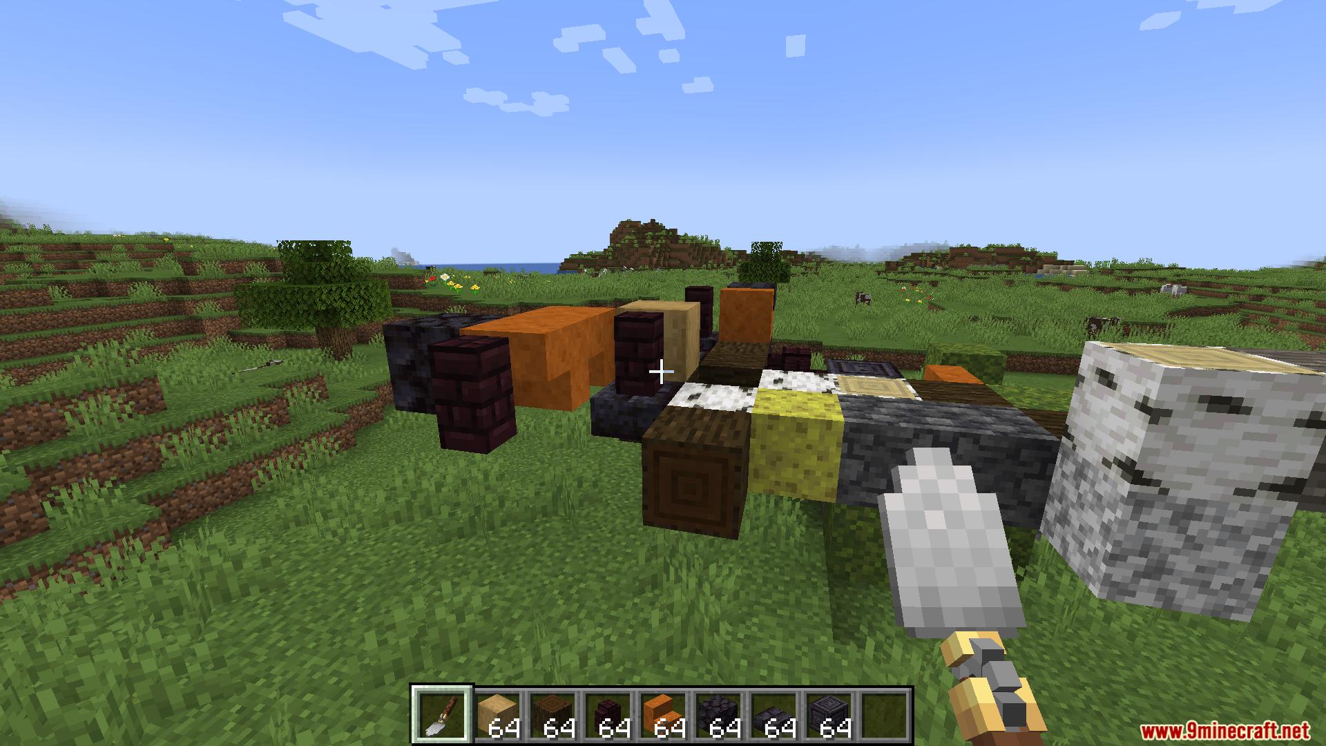 A player placing various blocks using the trowel tool