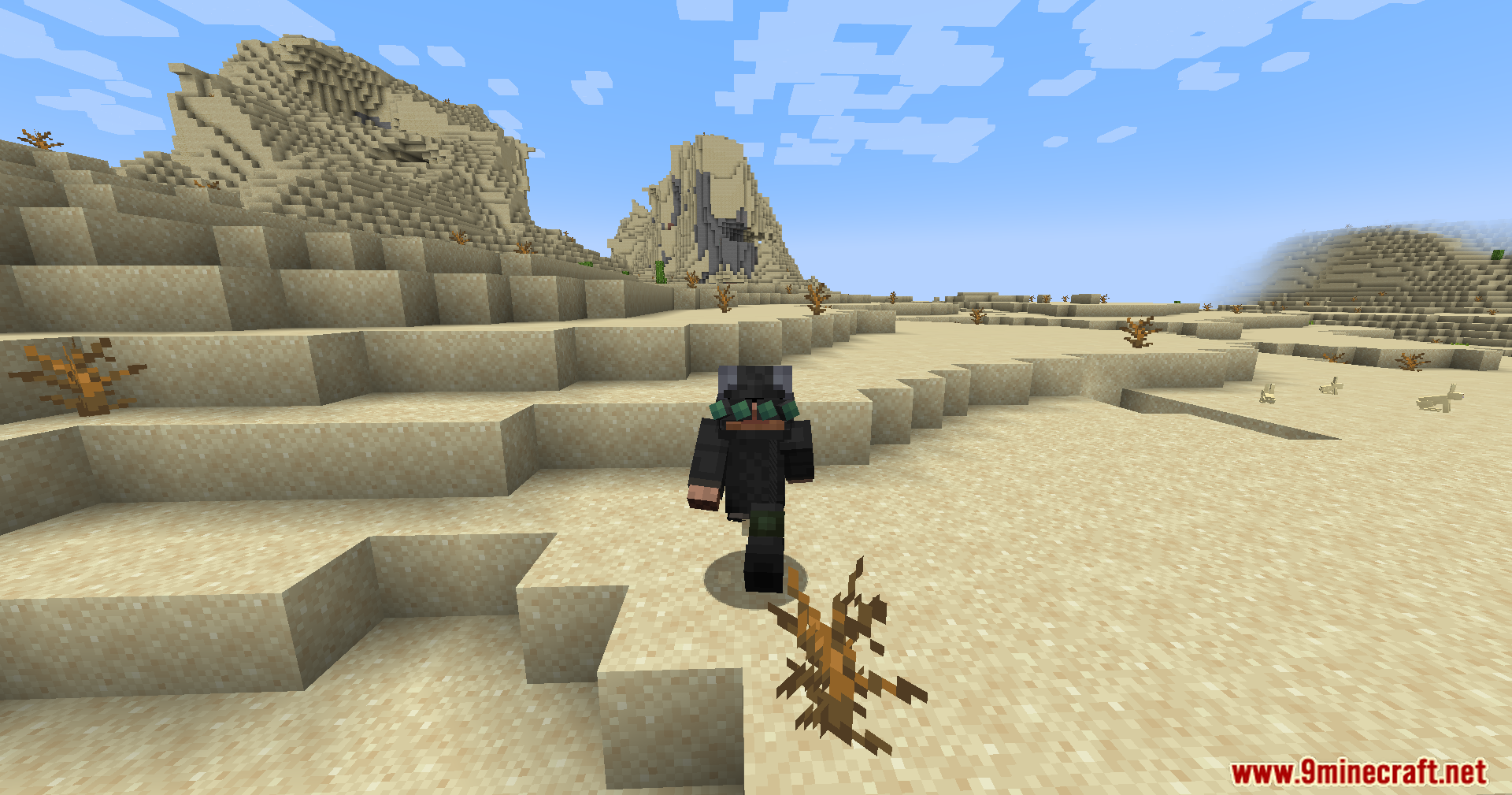 Exploring a desert landscape wearing full military gear