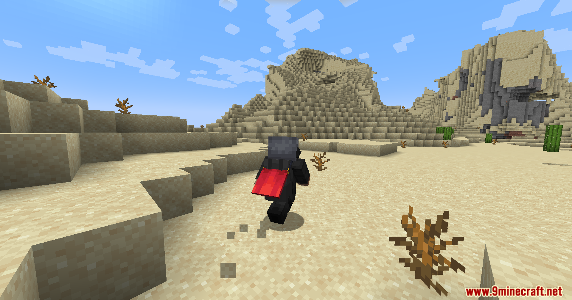 Player with a red backpack running through the desert