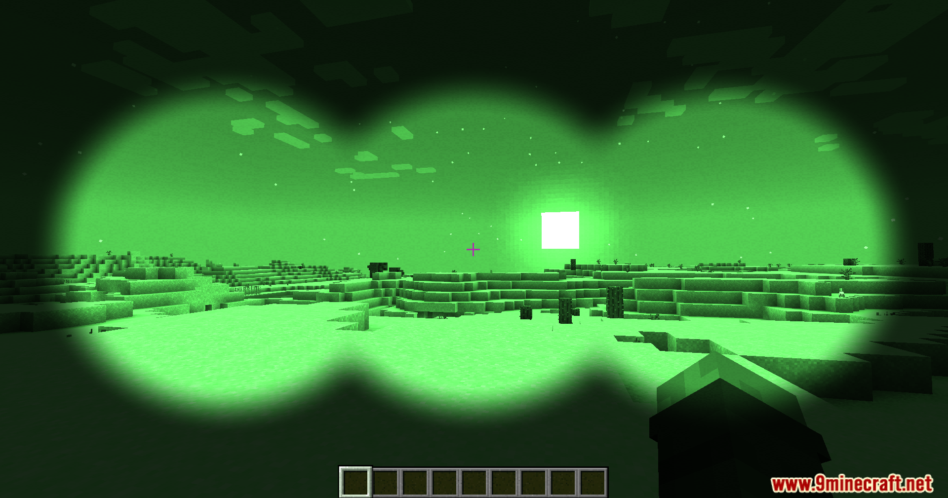 Night vision view of a desert landscape at night