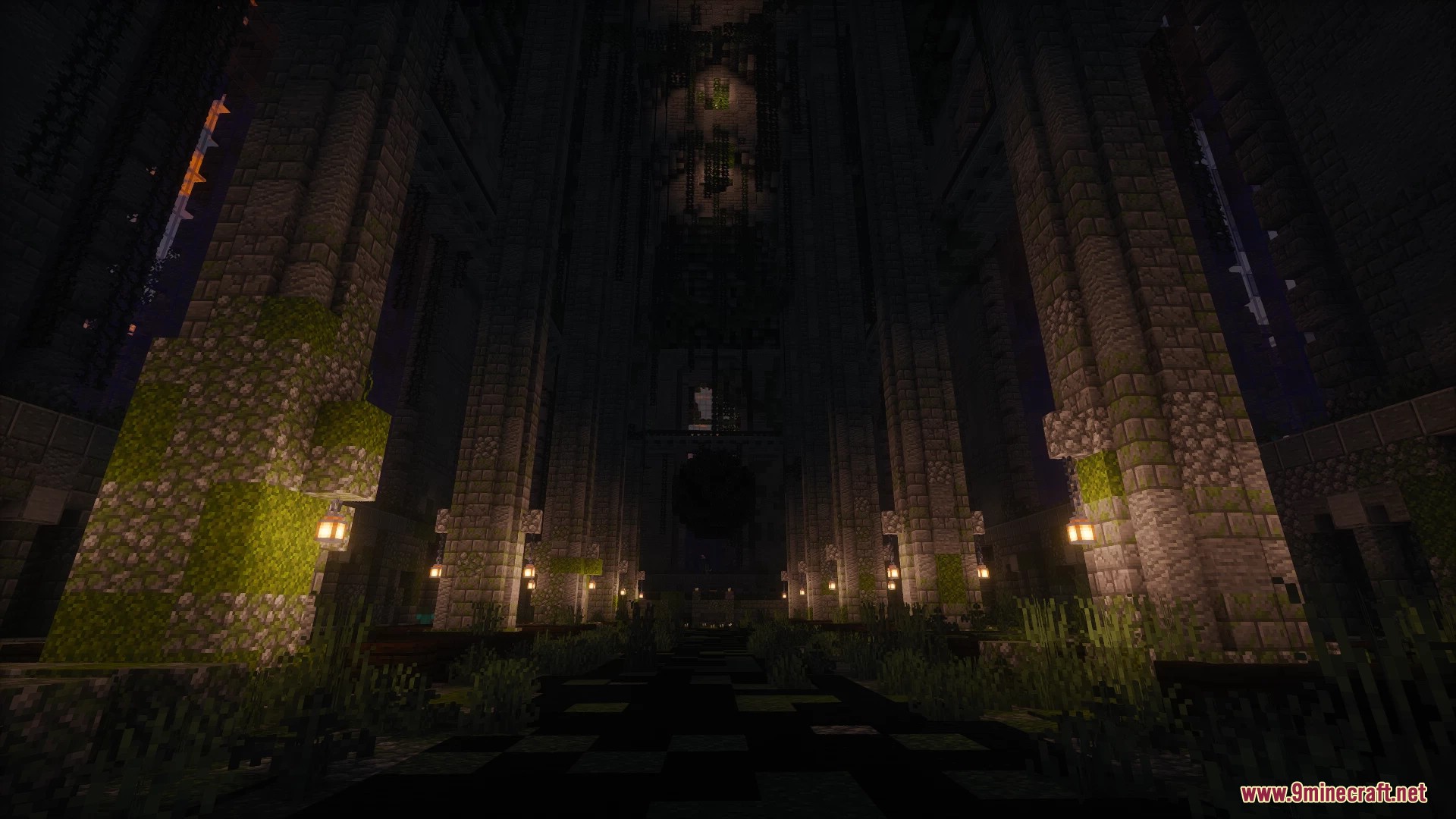 Dark interior hall with tall stone pillars covered in green moss