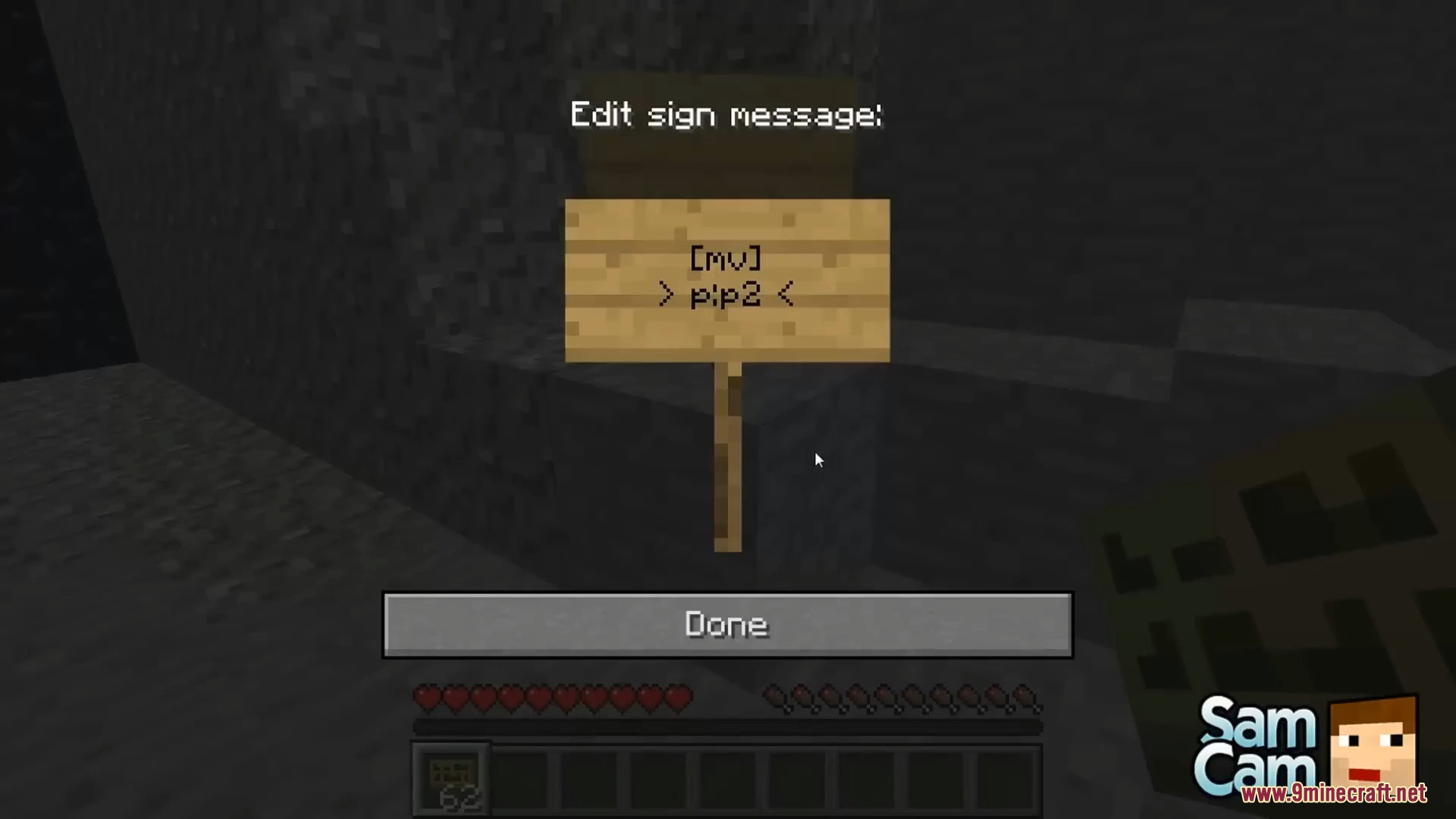Player editing a sign message to create a portal