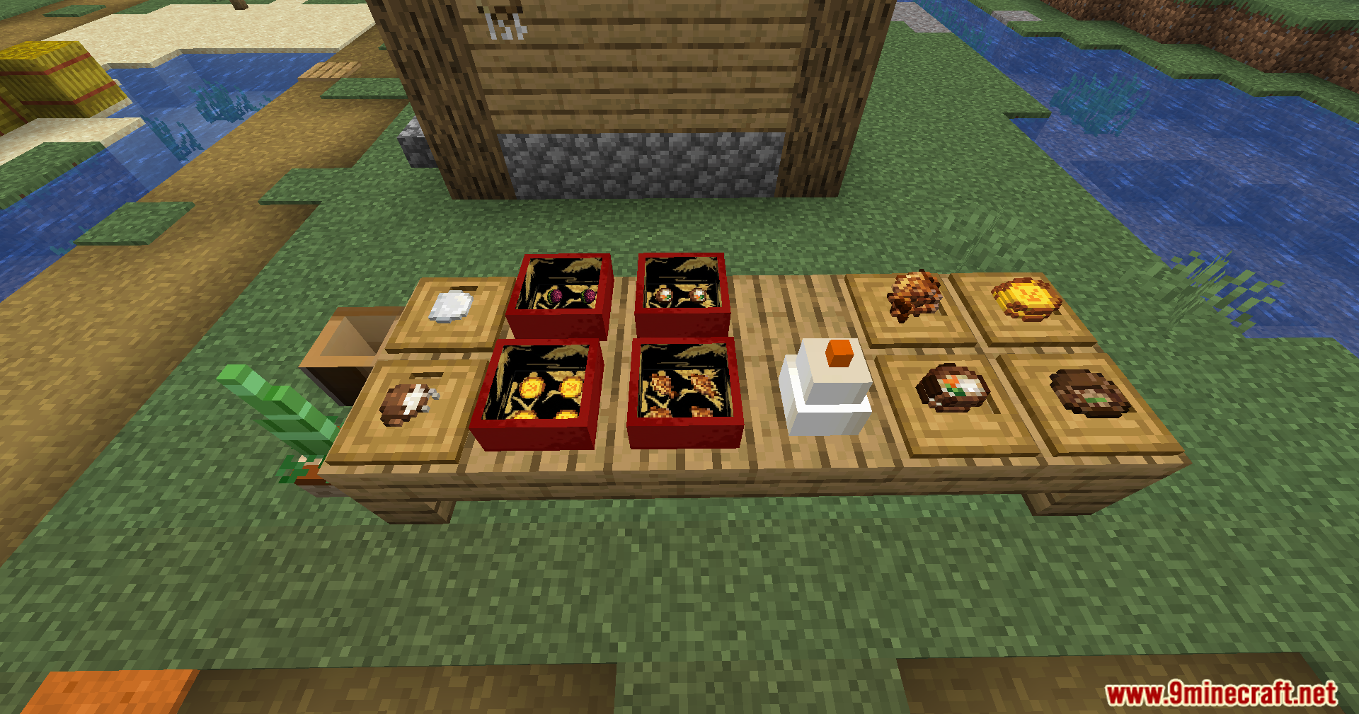 A long wooden table laden with Osechi boxes and mochi