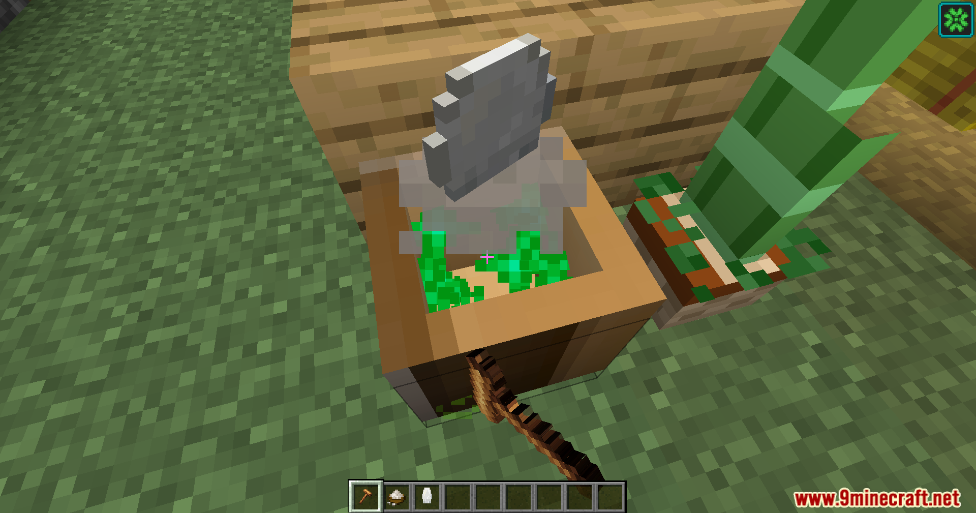 Pounding mochi with a large wooden mallet